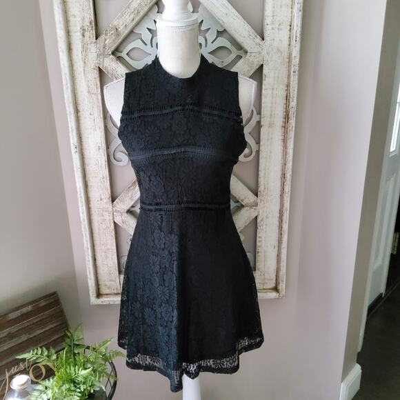 Francesca's Women's Sleeveless Lace Mock Neck Fit & Flare Mini Dress in Black - Picture 2 of 13